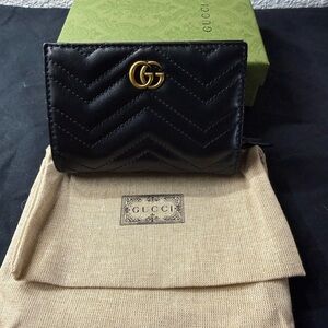Gucci Black Leather Wallet with Gold Logo